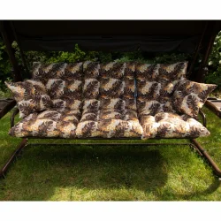 Huśtawka ogrodowa z zestawem poduszek w liściasty wzór brązowy-beżowy. Idealna do relaksu na świeżym powietrzu.