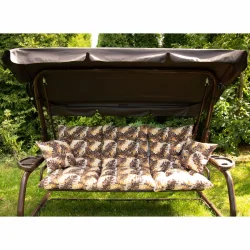 Ogrodowa huśtawka z daszkiem i poduszkami w liściasty wzór, w odcieniach brązu i zieleni. Idealna do ogrodu.