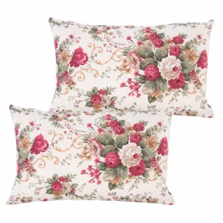 Zestaw jaśków dekoracyjnych na sofę z kwiatowym wzorem w różowych i zielonych odcieniach.