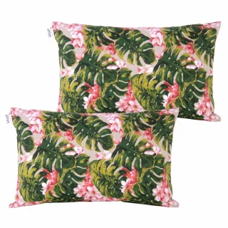 Zestaw jaśków na kanapę z motywem tropikalnym w zielone liście i różowe kwiaty.