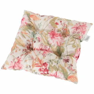 Poduszka na krzesło w kwiaty, pojedyncza sztuka. Dominuje wzór z różowymi i zielonymi liśćmi na białym tle.