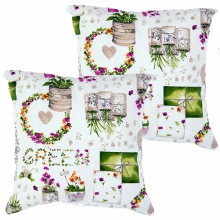 Zestaw jaśków dekoracyjnych na kanapę, w jasnych kolorach z roślinnym wzorem.