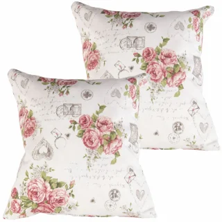 Zestaw jaśków dekoracyjnych na kanapę z motywem kwiatowym w kolorze różowym na białym tle.