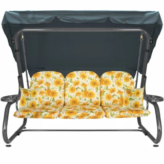 Huśtawka ogrodowa do ogrodu z motywem słoneczników na jasnym tle. Posiada metalową konstrukcję i daszek w kolorze zielonym.