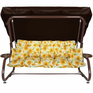 Huśtawka ogrodowa metalowa do ogrodu, cała, z brązowym daszkiem i poduszkami w żółte słoneczniki.