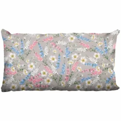 Poduszka dekoracyjna do salonu z kwiatowym wzorem w pastelowych kolorach. Jednokolorowe tło z barwnymi akcentami.