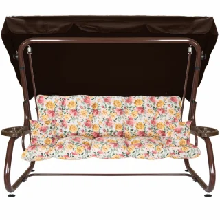 Ogrodowa huśtawka z brązowym daszkiem i kwiecistymi poduszkami. Przeznaczona do ogrodu.